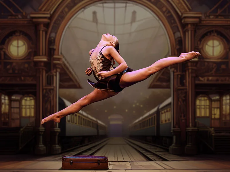 Dancer on stage in leap by Dance photographer in Edinburgh Scotland